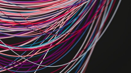 A tangle of bright multicolored cables flowing gracefully across black space. The smooth, curved lines evoke concepts of data connection, communication, and digital networks, blending tactile realism