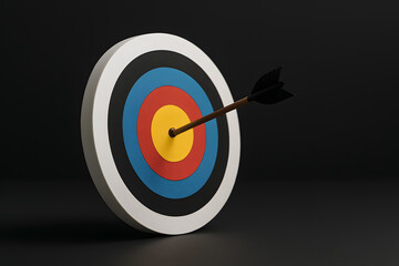 Arrow hitting bullseye on colorful archery target against black background symbolizing accuracy and achievement