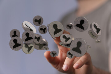 Conceptual depiction of social network connection interface with a hand reaching out, representing...