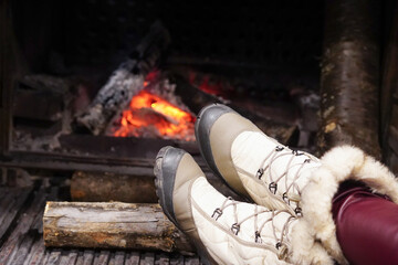 Warm Fireplace with Winter Boots