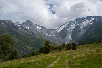 The Bionnassay glacier in Europe, France, Auvergne Rhone Alpes, Haute Savoie, in summer, on a sunny day.