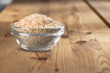 Sesame seeds scattered. Spices for buns and bread