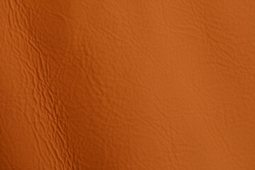 Brown leather texture background with detailed surface showing the natural patterns and imperfections. Suitable for design and backgrounds.