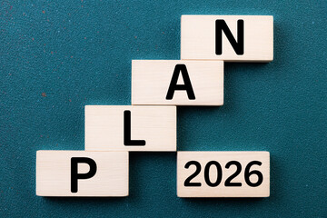 2026 New Year card. New Years goals 2026 with wooden cube, target icon. Concept 2026 New Year background. Goal, plan, action, business, resolutions,  financial, success, ideas