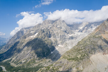 This landscape photo was taken in Europe, Italy, Aosta Valley, in summer. It shows the glacier and...
