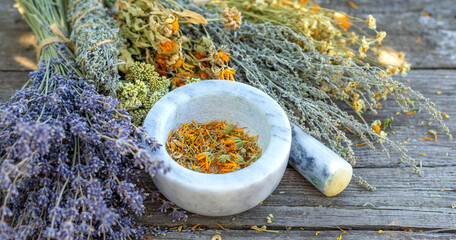 Dried medicinal herbs and flowers. Selective focus.
