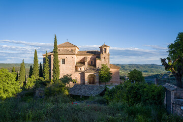 Obraz premium This landscape photo was taken in Europe, Spain, Aragon, Alquezar, in summer. It shows the San Miguel church in Alquezar, under the Sun.