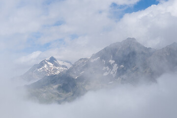 This landscape photo was taken in Europe, France, Auvergne Rhone Alpes, Haute Savoie, in summer. We can see the mountains, under the Sun.