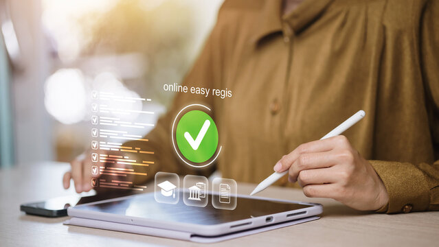 Woman using tablet with hologram online registration concept digital form and e-learning system