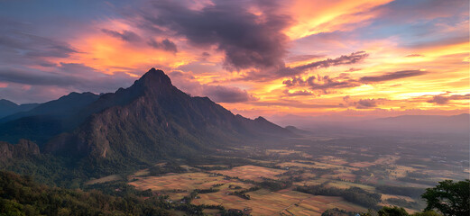 The Mountain peak at golden hour in summer. The long exposure captures  Mountain landscape at sunset Panoloma view.