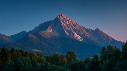 The Mountain peak at golden hour in summer. The long exposure captures  Mountain landscape at sunset Panoloma view.