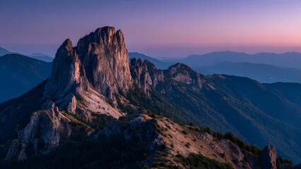The Mountain peak at golden hour in summer. The long exposure captures  Mountain landscape at sunset Panoloma view.