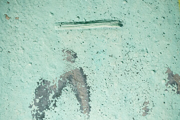 Turquoise painted wall with a metal element. Background image. Grunge.