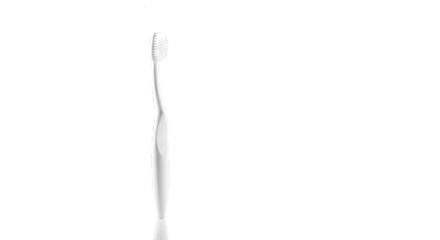 White toothbrush casts shadows. Product staging or dental branding mockup.