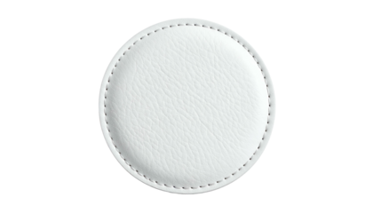 A white, circular, leather-textured coaster with detailed stitching, against a black backdrop
