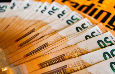 macro detail of a bunch of 50 euros banknotes