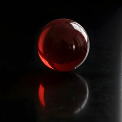 Red sphere on black background