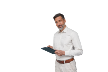 Middle aged businessman holding tablet and smiling, portraying confidence and modern communication, transparent background