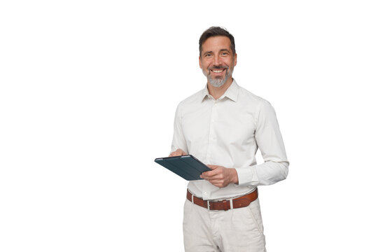 Smiling professional man holding a modern tablet, planning digital strategy, standing confidently. Transparent background