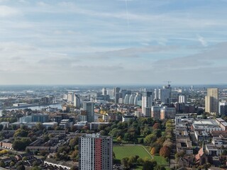Naklejka premium Aerial view of buildings and landmarks with views of Salford Quays in the background. Manchester England. 