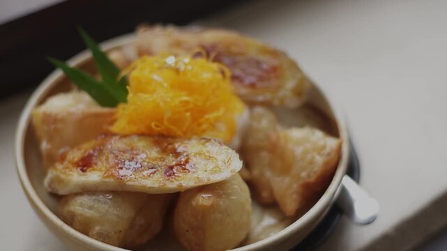Fusion food of Dim Sum is traditional chinese food, people traditionally enjoy in restaurants for breakfast and lunch. Close up of Steamed Dim Sum in bamboo dish at chinese restaurants.