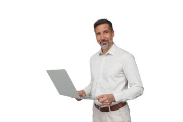 Smiling middle aged businessman standing, holding laptop, expressing confidence, transparent background