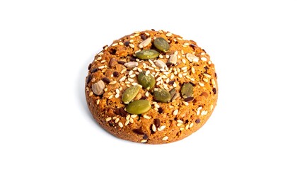 A single, round, golden-brown cookie with various seeds on top, against a plain white backdrop