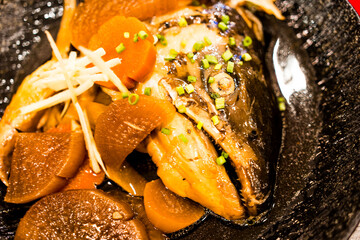 Japanese salmon head steamed with soy suace. Salmon Kabutoni