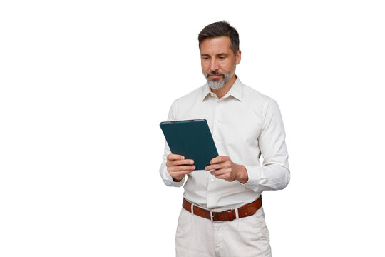 Mature businesssman using digital tablet for remote work, researching online, standing on transparent background