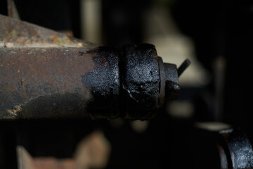 Paint on rusty metal. Rough style, background image. Railway, graffiti.