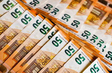 close up macro detail of 50 euros banknotes , cash money background