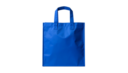 Bright blue tote bag with two handles, standing upright against a stark black background