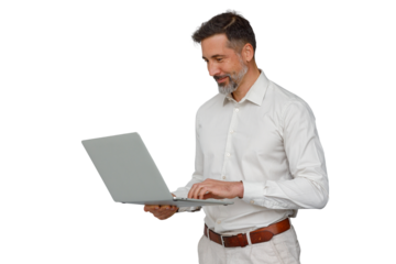 Mature businessman working on laptop, typing and smiling, standing and using technology, transparent background