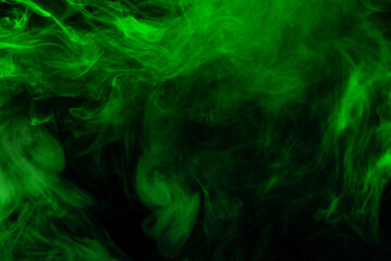 Fototapeta premium Green steam on a black background.