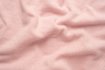 Fototapeta premium Soft pink cashmere sweater texture background.