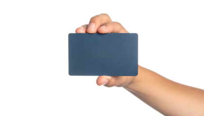 A hand, facing the viewer, holds a blank, dark blue rectangular card, isolated on black