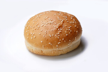 Fresh hamburger bun isolated on white background.