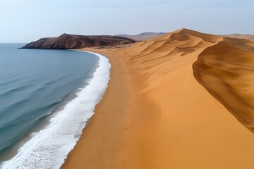Aerial View of Desert Beach Golden Sand Dunes Meet Ocean Waves
