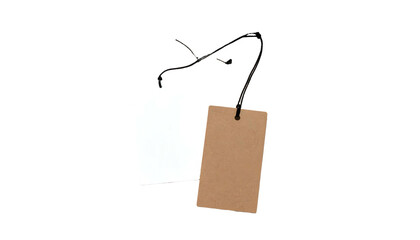 Two rectangular tags, one white, one brown, dangling from strings against a black background