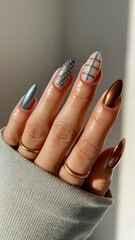 Butterfly and Plaid Nail Art with Metallic Blue Accent