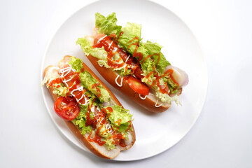 Delicious hot dog with salad and tomato for lunch. food photography.