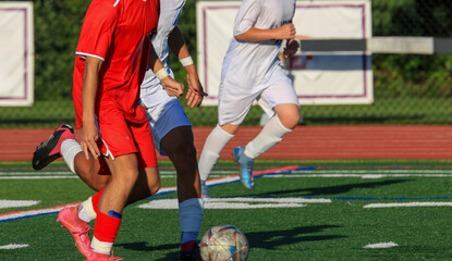 Exciting Soccer Match Between Players on a Sunny Day
