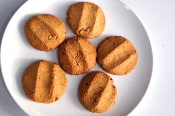 Tasty Cookies on White Ceramic Plate for Dessert.