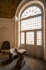 Broumov Monastery interior with old stone furniture and window