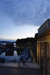 Evening view of the harbor and city walls in Zadar, Croatia