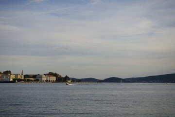 Scenic coastal view of Zadar, Croatia, with buildings, water, and sky