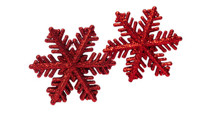 Two variations of glittery red snowflake Christmas decor isolated on transparent background
