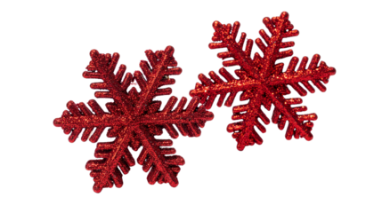 Two variations of glittery red snowflake Christmas decor isolated on transparent background