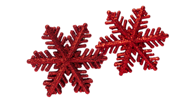 Two variations of glittery red snowflake Christmas decor isolated on transparent background