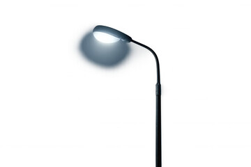 Obraz premium Street lamp illuminating area at night, providing urban light and security, transparent background, isolated